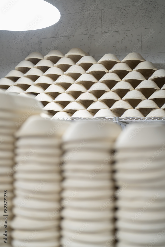 Lot of clay forms for baking lie on each other Lot of clay forms for baking lie on each other