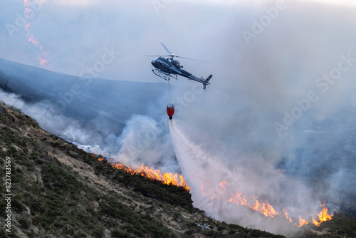 Firefighting aircraft attending a bushfire photo
