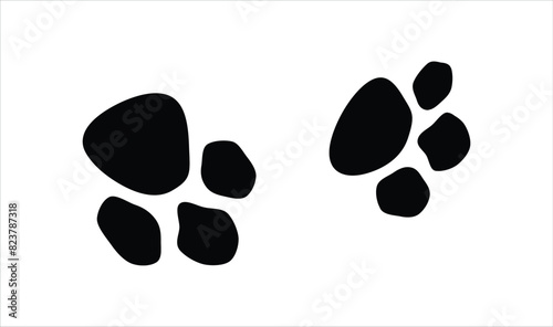 Paw icon vector illustration. paw print sign and symbol. dog or cat paw