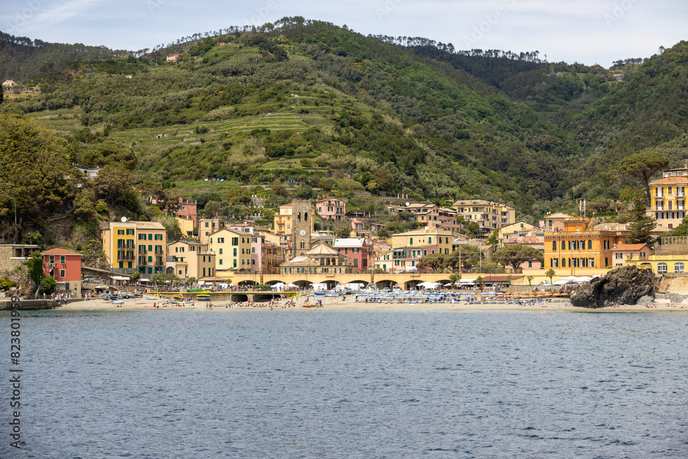 view of monterosso italy from the water on a sunny day view of monterosso italy from the water on a sunny day