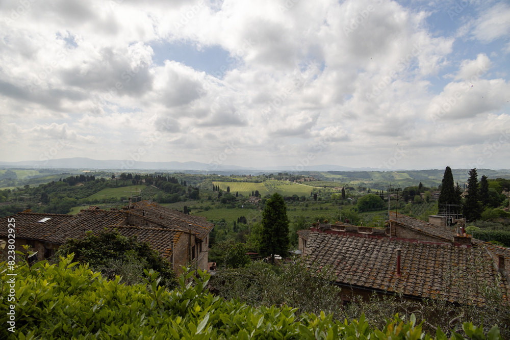a view of the tuscan hillside in italy a view of the tuscan hillside in italy