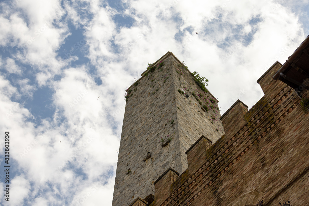 low angle view of a tower in san Gimignano italy low angle view of a tower in san Gimignano italy