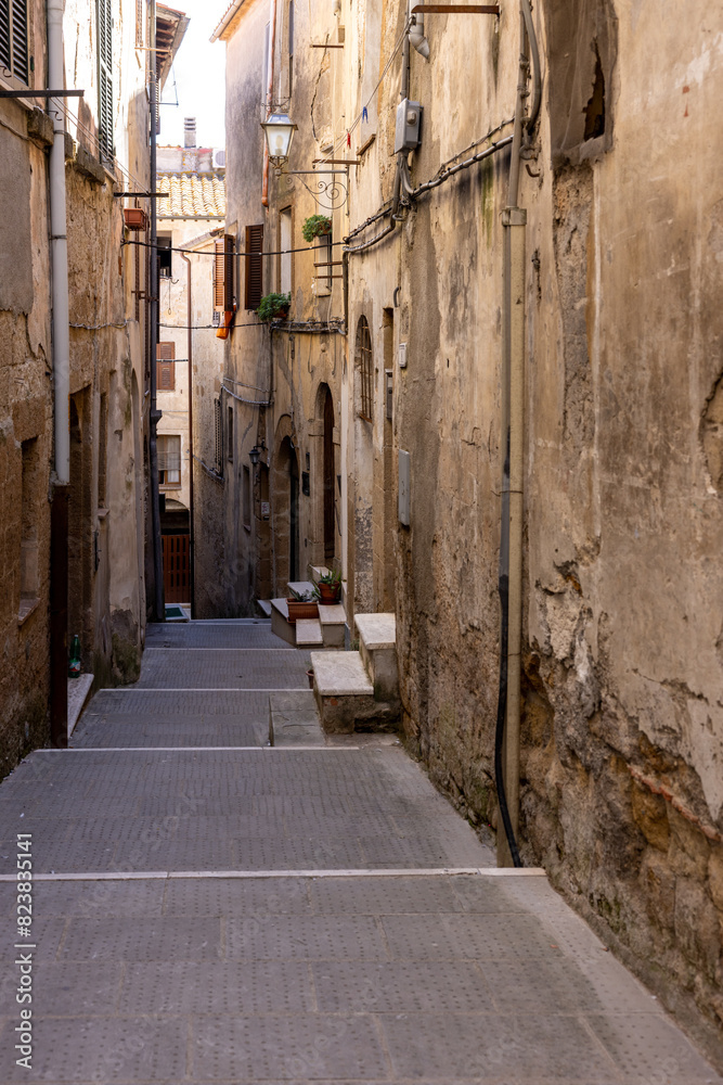 Pitigliano - the picturesque medieval town founded in Etruscan time on the tuff hill in Tuscany, Italy. Pitigliano - the picturesque medieval town founded in Etruscan time on the tuff hill in Tuscany, Italy.