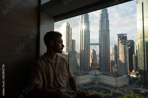 Man enjoying the views of the Petronas Towers photo