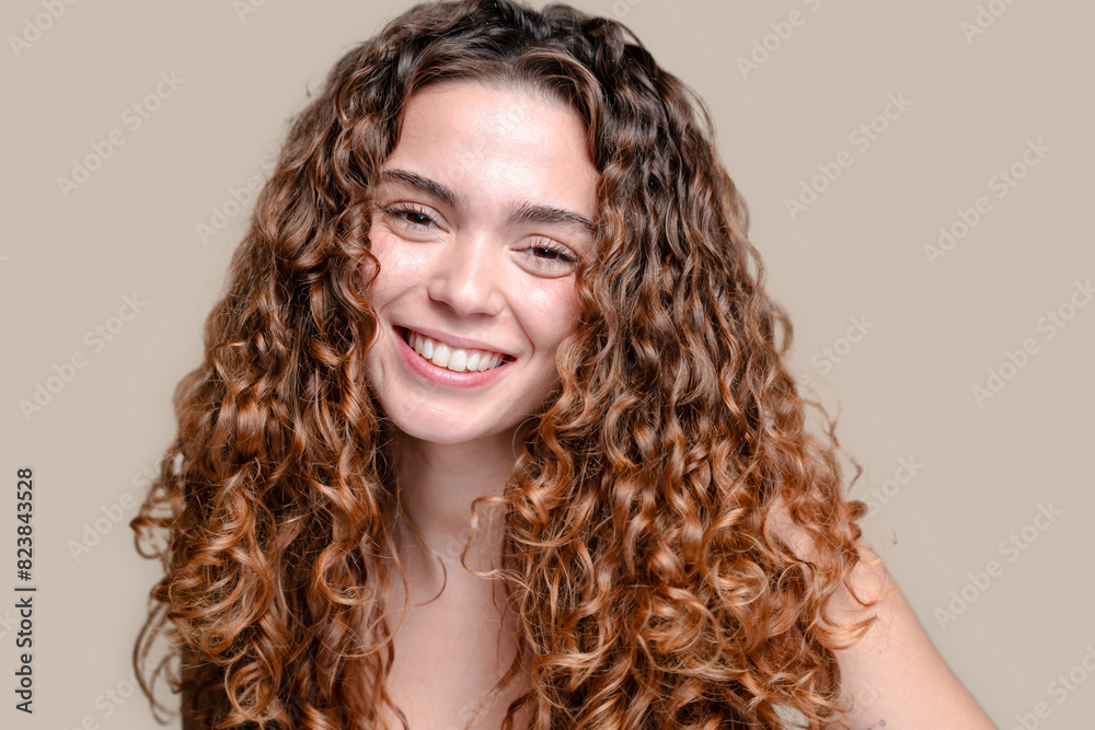 Portrait of a young woman smiling. Portrait of a young woman smiling.