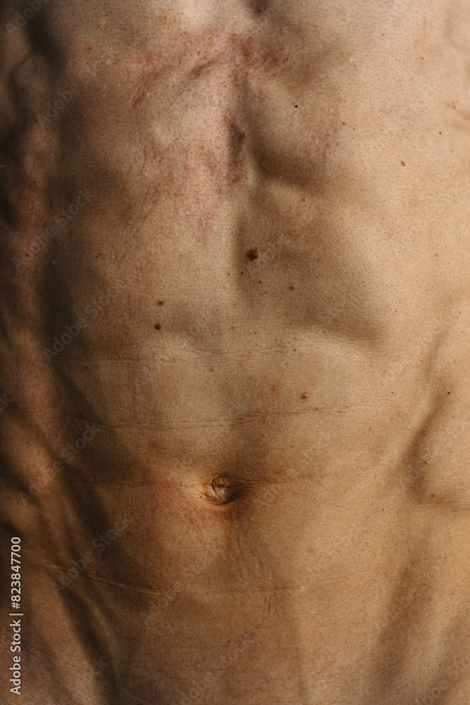 Close up Man bare-chested athlete, skin texture of torso of a man
