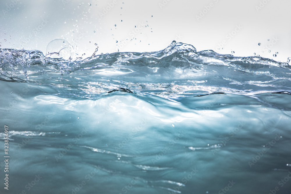 Close up of clear blue tropical wave breaking Close up of clear blue tropical wave breaking