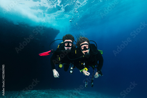Mother and son Scuba Diving photo
