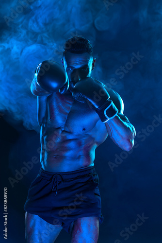 Man Athlete Boxer banner. Template for a sports magazine on the theme of boxing with copy space. Mockup for betting advertisement. © Mike Orlov