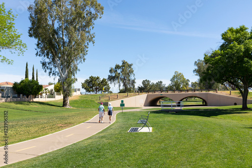Walkers on Bike path in Park Scottsdale, Arizona in summer 