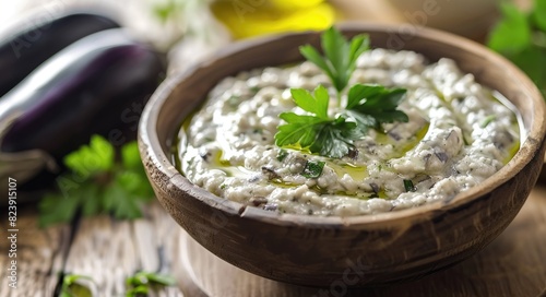 Blende - Greek Aubergine Dip with Smoky Flavors on Rustic Wooden Table photo
