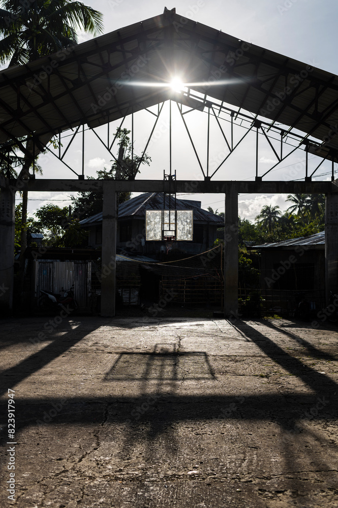 Basketball court in a sports center in a rural village Basketball court in a sports center in a rural village