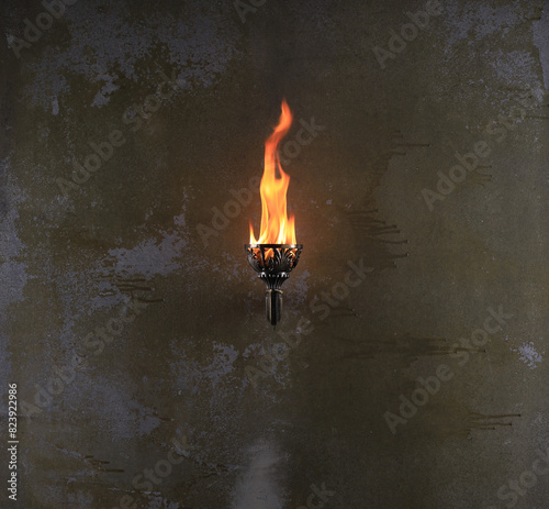 ancient torch on an old wall