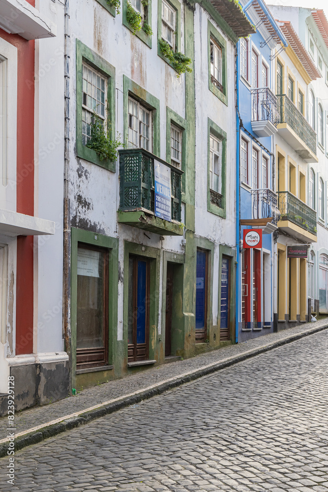 Buildings along a cobbled street on Terceira Island, Azores. Buildings along a cobbled street on Terceira Island, Azores.