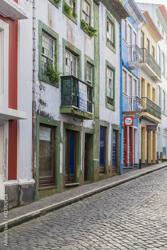 Buildings along a cobbled street on Terceira Island, Azores. © Emily_M_Wilson