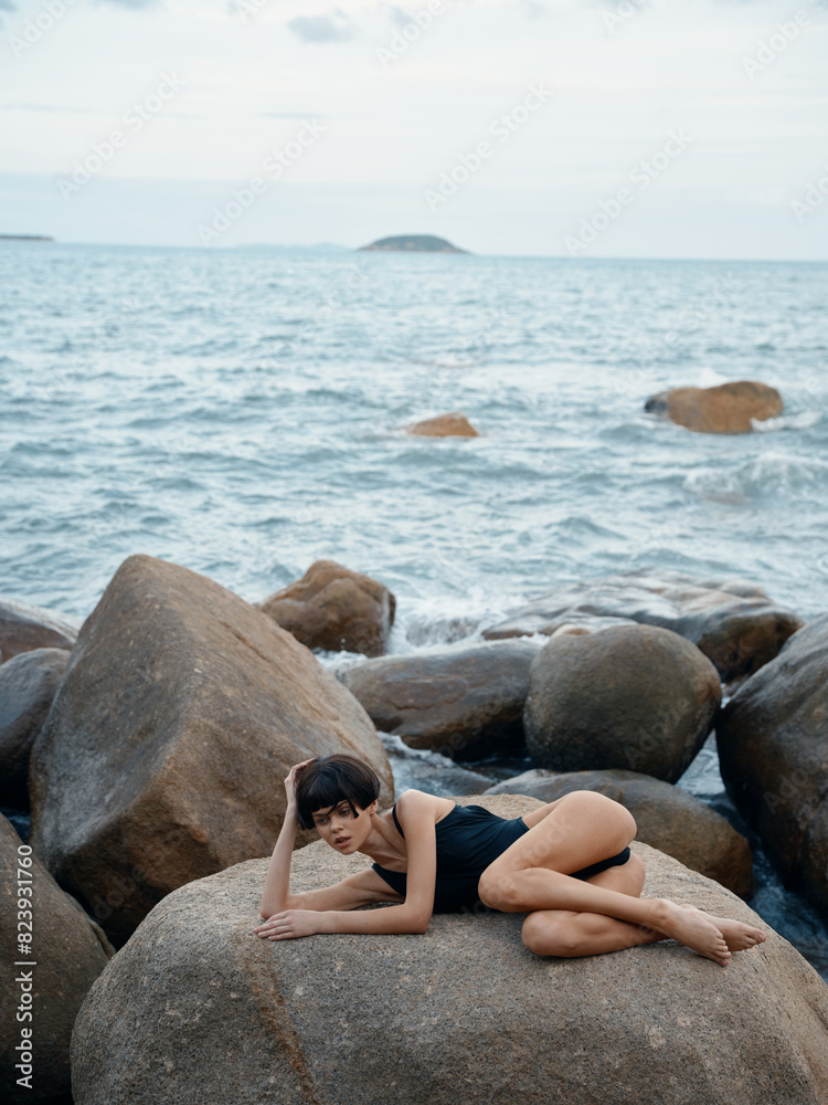 Beach Beauty: A Sensual Bikini Model Poses in Swimwear, Radiating Happiness and Relaxation in a Gorgeous Tropical Paradise on a Sunny Summer Day. Beach Beauty: A Sensual Bikini Model Poses in Swimwear, Radiating Happiness and Relaxation in a Gorgeous Tropical Paradise on a Sunny Summer Day.