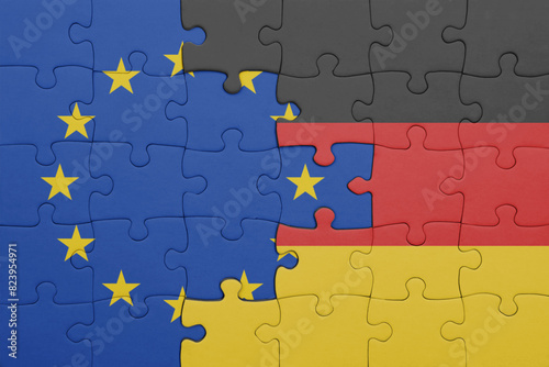 Photography puzzle with the colourful national flag of germany and flag of european union