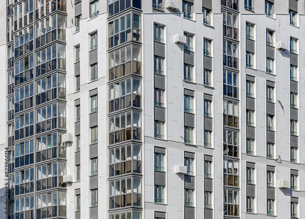 Condominium building, window house facade. Apartment abstract windows, city property hotel balcony. Business design block condo complex exterior, office residential new high tower. Modern rent system Condominium building, window house facade. Apartment abstract windows, city property hotel balcony. Business design block condo complex exterior, office residential new high tower. Modern rent system
