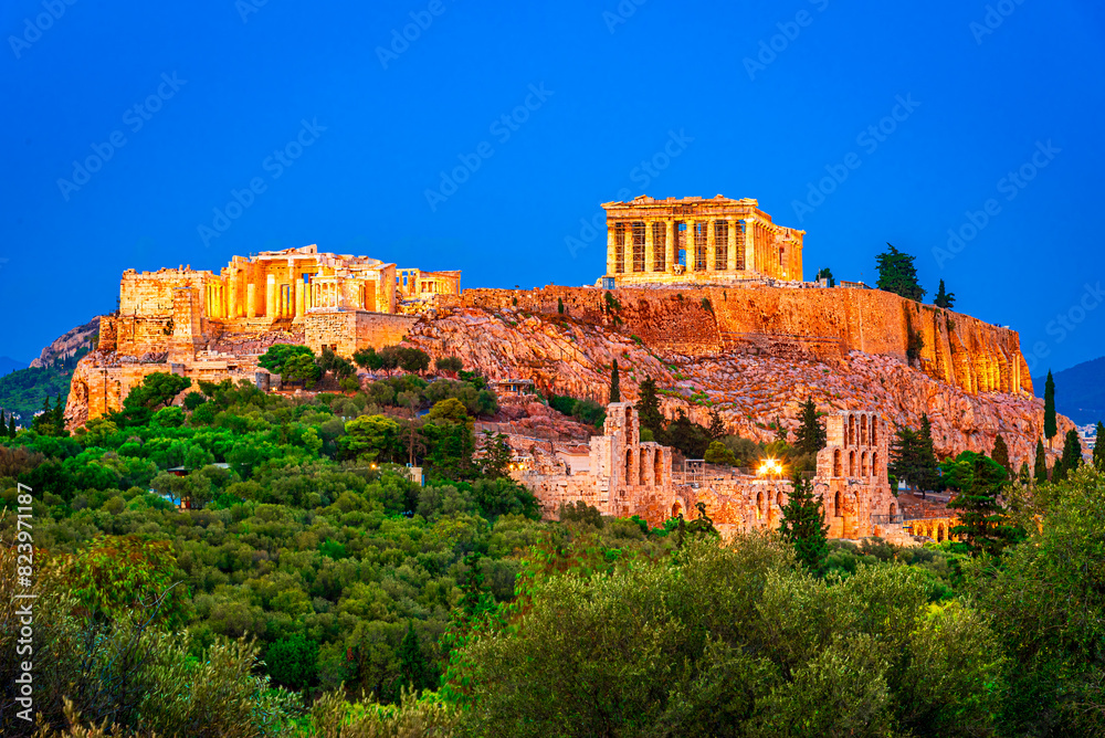 Fototapeta premium Athens, Greece: The Famous Acropolis of Athens with Parthenon Temple, Odeon of Herodes Atticus, Herodeion, at sunset. Europe