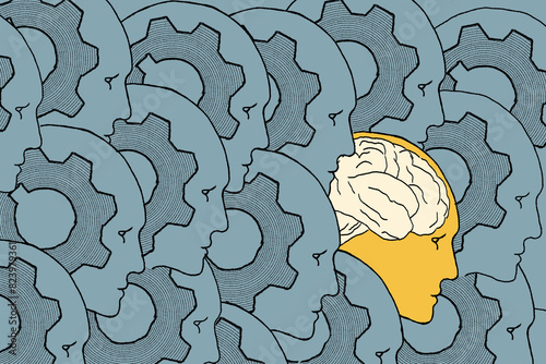 A unique yellow head with a detailed brain stands out among multiple blue human heads with cogs, representing individuality and thought amidst uniformity.