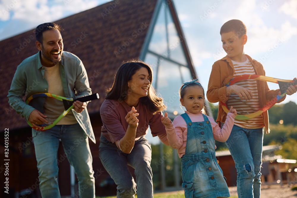 Playful family having fun together outdoors. Playful family having fun together outdoors.