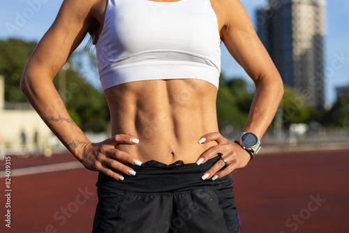 Fotografie woman body female runner six pack abs