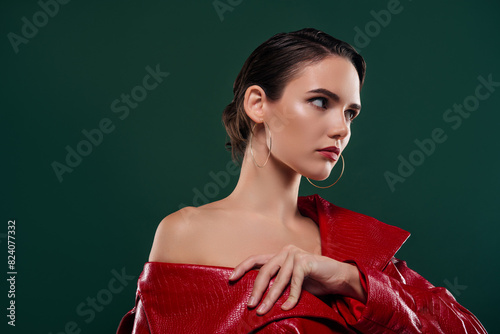Photo attractive lady touch wear fashion coat look profile side isolated dark color background © Beauty Hero