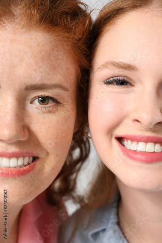 Stylish happy redhead siste...