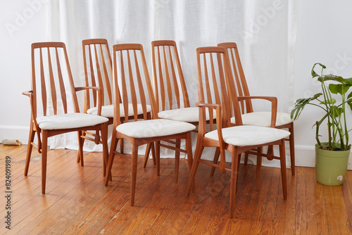 Vintage 1960s Dining Chairs. Chunky white textured upholstery on stylish Mid-Century Modern chairs. Photographed in a home interior. 