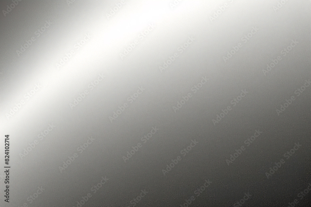 A tight shot of a polished metal surface adorned with a silver pattern, overlain by silver metallic foil
A tight shot of a polished metal surface adorned with a silver pattern, overlain by silver metallic foil