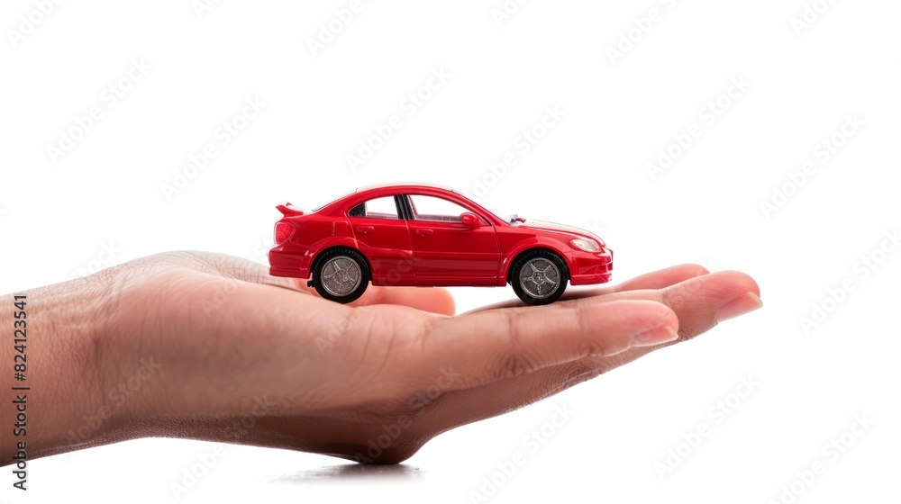 holding toy car white background
