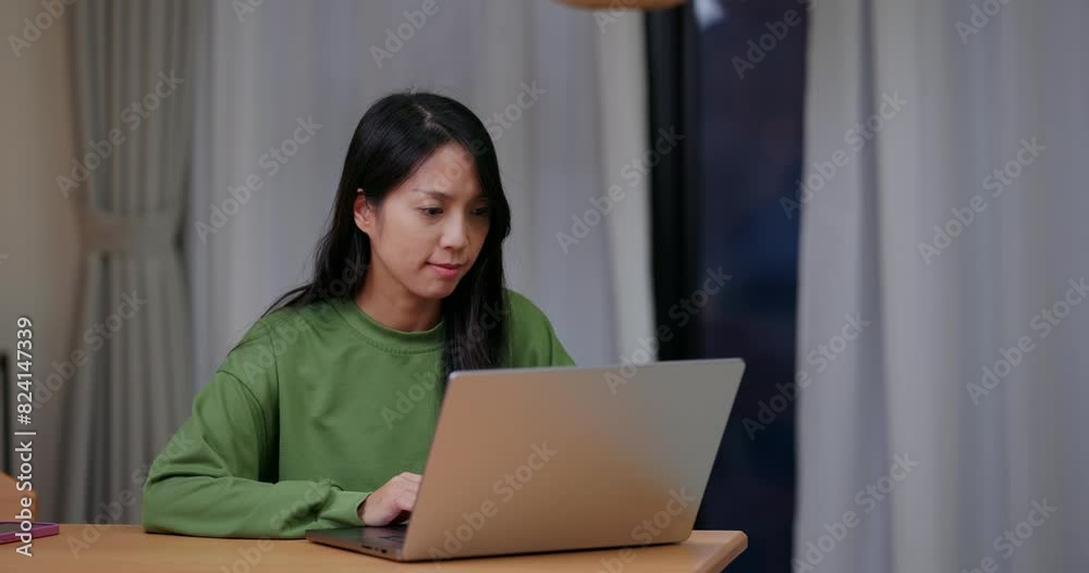 Woman work on laptop computer at home Woman work on laptop computer at home