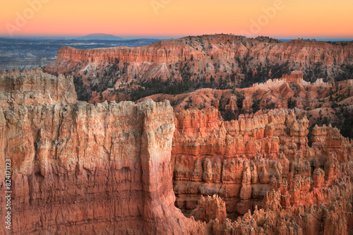 Colorful twilight afterglow and hoodoos seen from Sunrise Point, Bryce Canyon National Park, Utah. photo