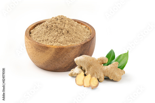 Ginger powder in wooden bowl with ginger and leaves isolated on white background.