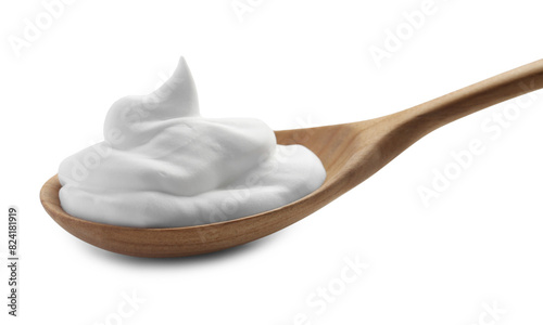 Wooden spoon with sour cream isolated on white