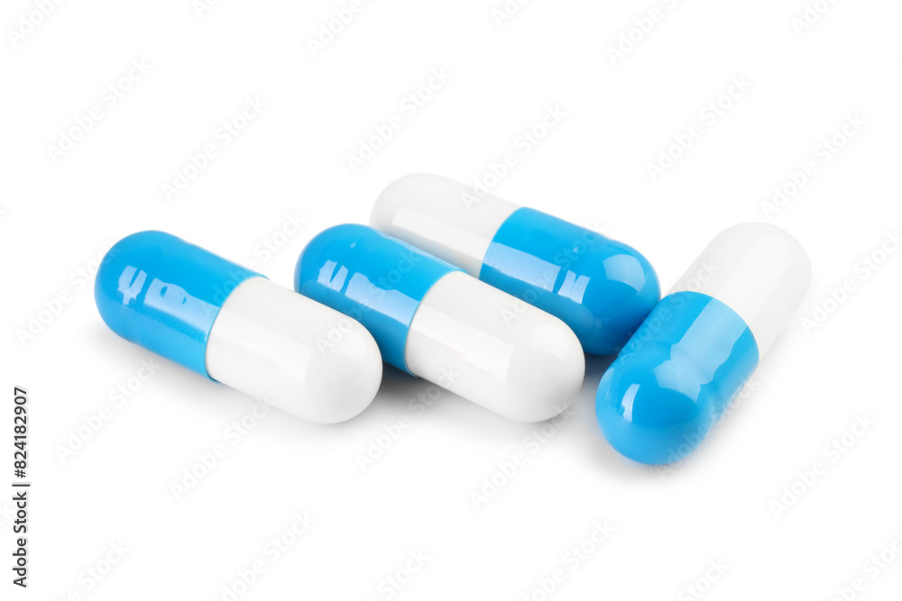 Antibiotic pills isolated on white. Medicinal treatment Antibiotic pills isolated on white. Medicinal treatment