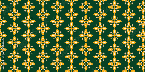 pattern of colorful yellow blooming flowers on a green background