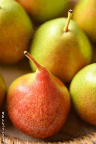 Fresh pear fruit in natural basket, Food background