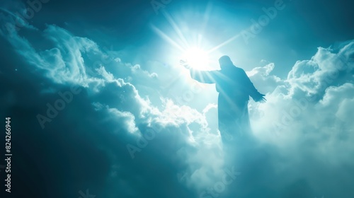 The resurrected Jesus Christ reaching out with hand above the cloud with light shining photo