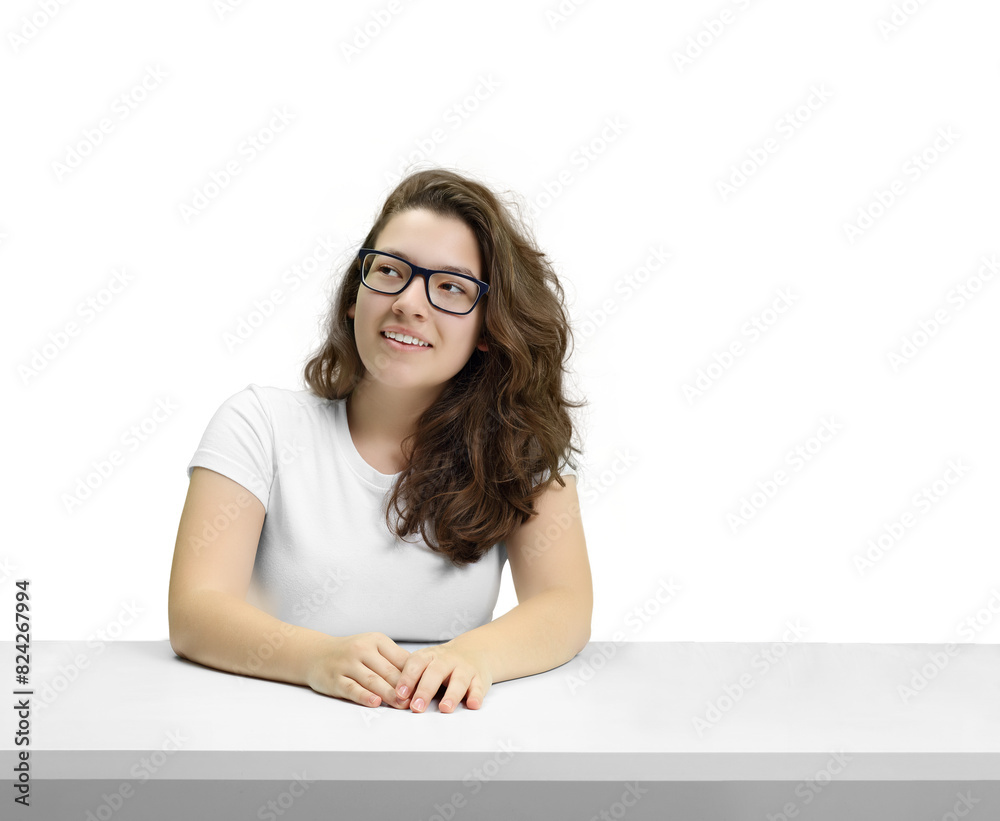 young and friendly teacher at her desk interacting the class young and friendly teacher at her desk interacting the class