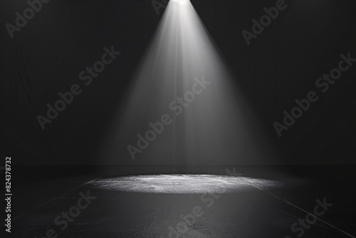 Empty stage with a spotlight in a dark room