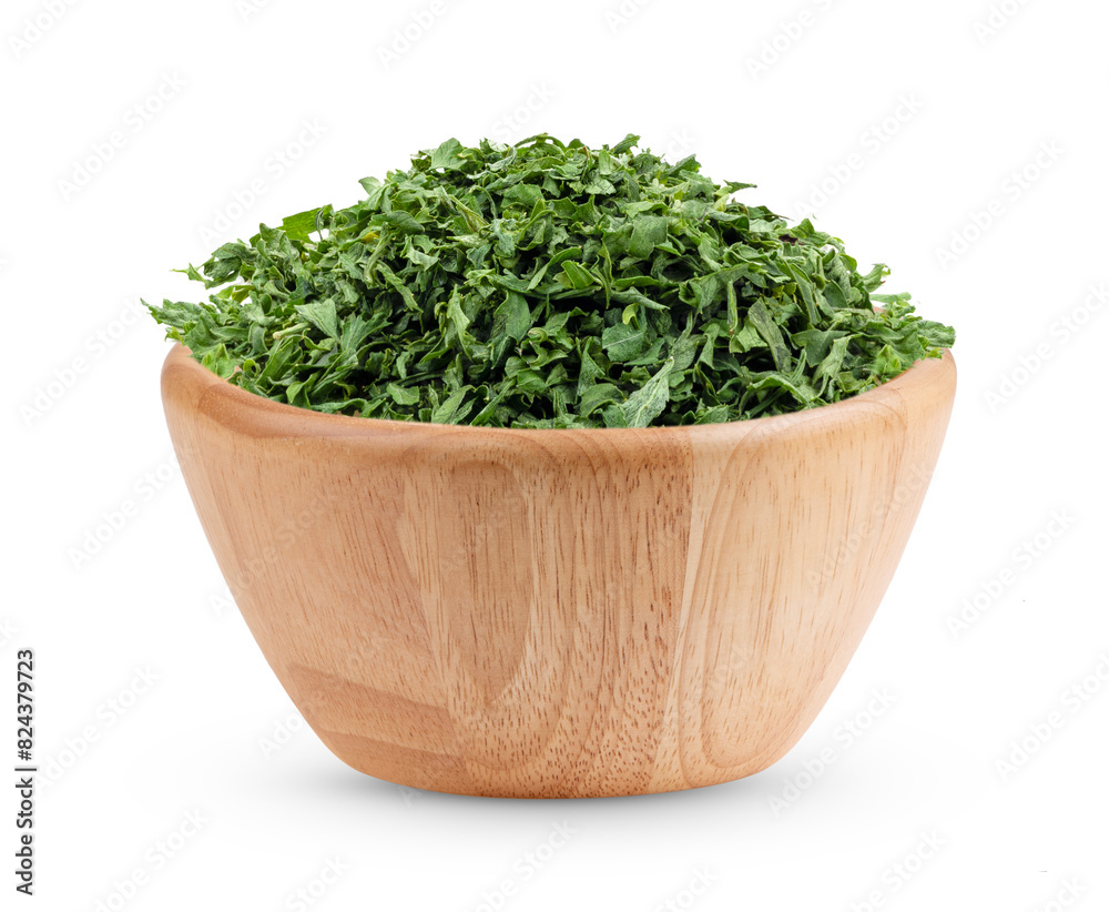 Dried parsley in wood spoon isolated on transparent png Dried parsley in wood spoon isolated on transparent png