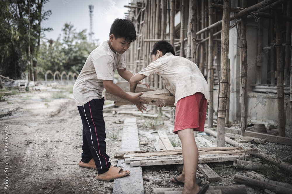 Poor children are forced to work in construction. are forced to work in the construction area. Human rights concepts, stopping child abuse, violence, fear of child labor and human trafficking. Poor children are forced to work in construction. are forced to work in the construction area. Human rights concepts, stopping child abuse, violence, fear of child labor and human trafficking.
