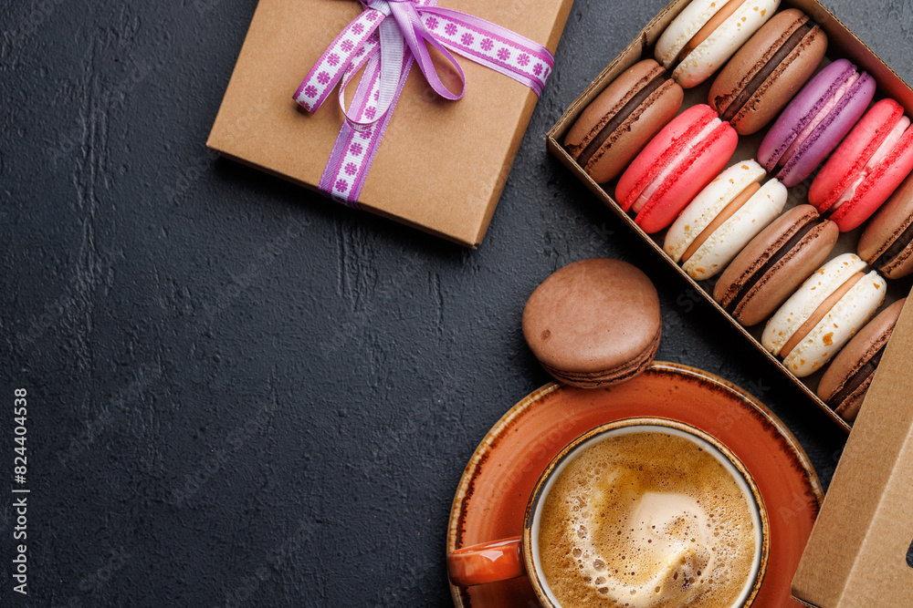 Coffee and colorful macaroons in gift box Coffee and colorful macaroons in gift box