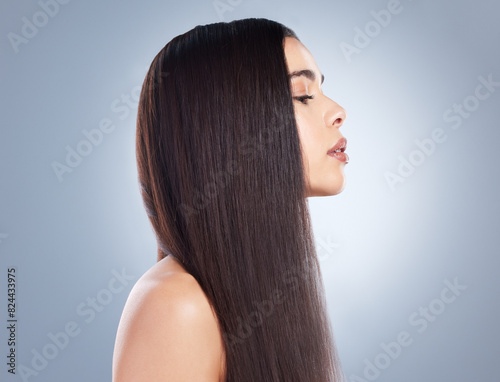 Woman, profile and hair care in studio with beauty for luxury salon treatment, shampoo and cosmetics. Girl, hairstyle and glow with healthy texture, transformation or growth on white background
