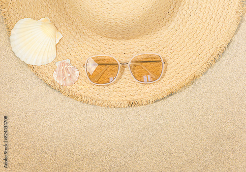 Straw hat on the sand, summer concept, Copy space