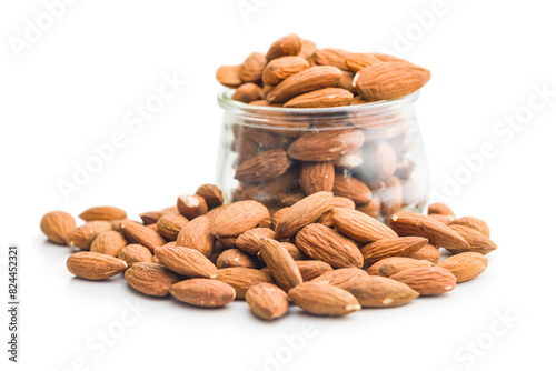 Peeled almond nuts in jar isolated on white background. © Jiri Hera