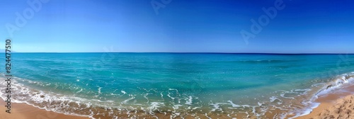 Panorama view of clear blue sky and turquoise sea at a sandy beach