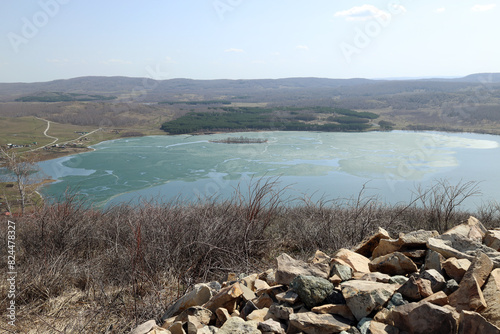 the ice is melting on the lake. serene spring landscape photo