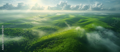 Aerial photography of a green grassland  clouds  sunshine  nature  World Environment Day  protecting nature as the theme  travel  tourism  lifestyle  retirement life  pension mode  4k high-definition 